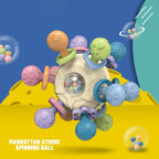 Minge senzorială bebeluși Manhattan Atomic Spinning Ball – cauciuc moale 0+